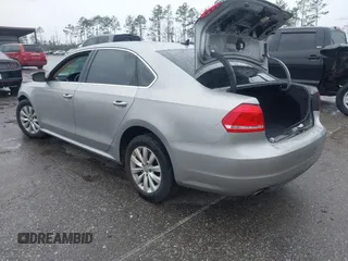 2012 Volkswagen Passat SE with VIN 1VWBH7A36CC077412, listed as a IAAI auction lot 41651796 with 113,259 mi miles and . Bid and sale history available at DreamBid. Image 3.