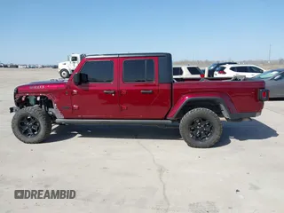 2021 Jeep Gladiator Willys z VIN 1C6HJTAG0ML536455, wystawiony jako IAAI lot #41702393 z przebiegiem 90 644 mil mil oraz . Historia ofert i sprzedaży dostępna na DreamBid. Obrazek 14.