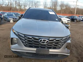 2022 Hyundai Tucson SEL with VIN 5NMJFCAE4NH060031, listed as a IAAI auction lot 41451874 with 57,228 mi miles and . Bid and sale history available at carsss.com. Image 12.