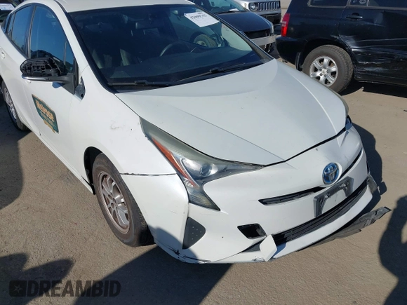 2016 Toyota Prius Two with VIN JTDKBRFUXG3001716, listed as a IAAI auction lot 42009763 with 177,132 mi miles and . Bid and sale history available at carsss.com. Image 6.