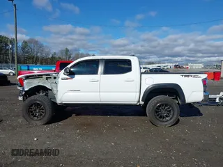 2020 Toyota Tacoma SR5 with VIN 3TMAZ5CN4LM132002, listed as a IAAI auction lot 41224844 with 55,000 mi miles and . Bid and sale history available at DreamBid. Image 15.