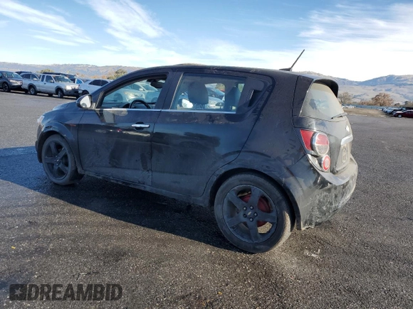 2012 Chevrolet Sonic LTZ z VIN 1G1JE6SH2C4126197, wystawiony jako Copart lot #85541214 z przebiegiem Nie podano mil oraz Szkoda całkowita • Salvage title. Historia ofert i sprzedaży dostępna na DreamBid. Obrazek 2.