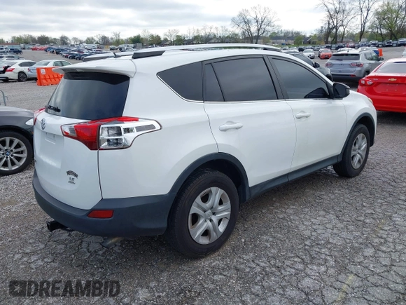 2014 Toyota RAV4 LE with VIN JTMBFREV2EJ006965, listed as a IAAI auction lot 41961470 with 194,881 mi miles and . Bid and sale history available at DreamBid. Image 4.