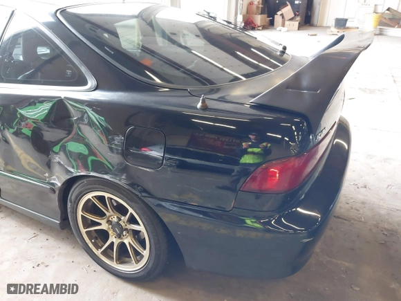1999 Acura Integra GS-R with VIN JH4DC2397XS001674, listed as a IAAI auction lot 41857042 with 205,494 mi miles. Bid and sale history available at carsss.com. Image 12.