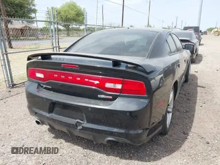 2012 Dodge Charger SRT8 with VIN 2C3CDXEJ7CH169853, listed as a IAAI auction lot 41857468 with 145,016 mi miles. Bid and sale history available at carsss.com. Image 4.