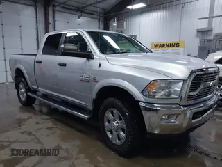 2014 Ram 2500 Big Horn with VIN 3C6UR5DL3EG321551, listed as a IAAI auction lot 41569943 with 197,507 mi miles and . Bid and sale history available at DreamBid. Image 1.