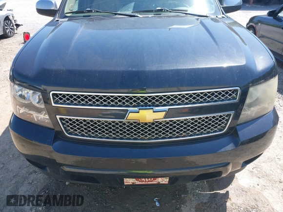 2011 Chevrolet Suburban LTZ with VIN 1GNSKKE31BR299912, listed as a IAAI auction lot 41990351 with 268,982 mi miles. Bid and sale history available at carsss.com. Image 12.