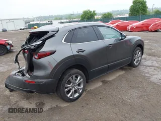 2023 Mazda CX-30 S Preferred z VIN 3MVDMBCM5PM576771, wystawiony jako IAAI lot #42244842 z przebiegiem 14 814 mil mil oraz . Historia ofert i sprzedaży dostępna na DreamBid. Obrazek 4.