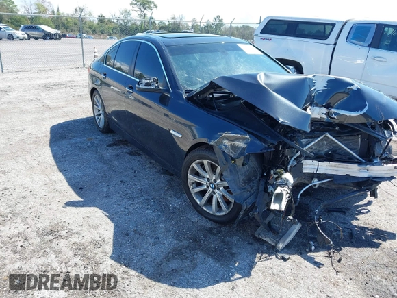 2014 BMW 5 Series 535i with VIN WBA5B1C54ED477525, listed as a IAAI auction lot 41692887 with 122,288 mi miles. Bid and sale history available at carsss.com. Image 1.