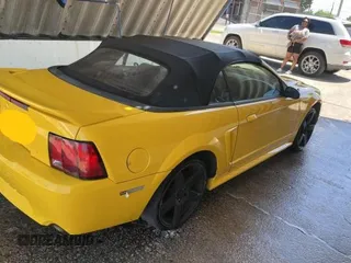 1999 Ford Mustang GT with VIN 1FAFP45X7XF114772, listed as a Copart auction lot 56733905 with 233,015 mi miles and Clean title. Bid and sale history available at DreamBid. Image 4.