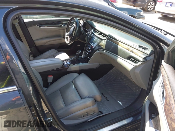 2013 Cadillac XTS Premium with VIN 2G61S5S33D9113653, listed as a IAAI auction lot 41837117 with 101,049 mi miles and . Bid and sale history available at DreamBid. Image 5.