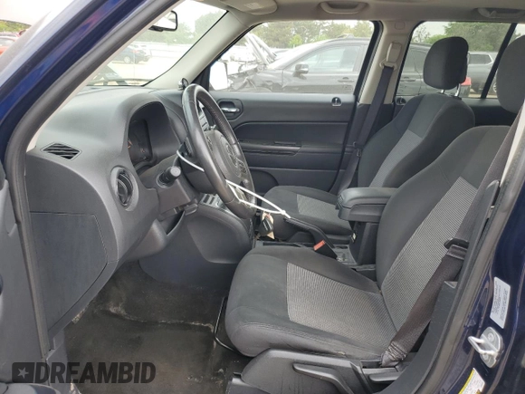 2015 Jeep Patriot Latitude with VIN 1C4NJRFB8FD366581, listed as a Copart auction lot 56221585 with 171,009 mi miles and Salvage title. Bid and sale history available at DreamBid. Image 7.