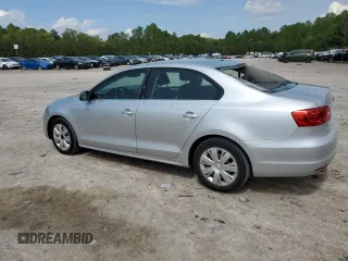 2013 Volkswagen Jetta SE with VIN 3VWDP7AJ7DM355504, listed as a Copart auction lot 54124995 with 79,474 mi miles and Salvage title. Bid and sale history available at DreamBid. Image 2.