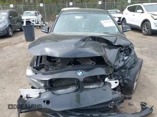 2014 BMW 3 Series 320i xDrive with VIN WBA3C3C59EF984070, listed as a IAAI auction lot 42063569 with 169,002 mi miles and . Bid and sale history available at DreamBid. Image 12.