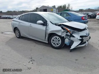 2016 Toyota Prius Two with VIN JTDKBRFUXG3023523, listed as a IAAI auction lot 41757143 with 124,144 mi miles. Bid and sale history available at carsss.com. Image 1.