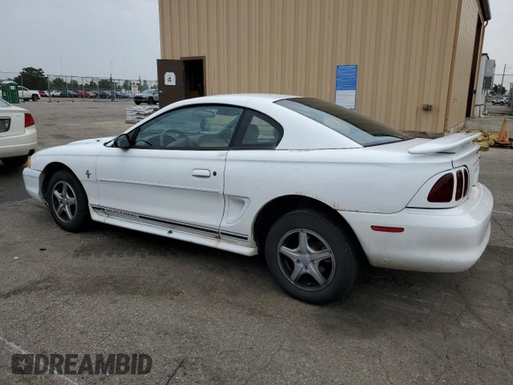 1997 Ford Mustang with VIN 1FALP4046VF180467, listed as a Copart auction lot 60754265 with 154,676 mi miles and Salvage title. Bid and sale history available at DreamBid. Image 2.