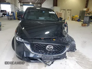2023 Mazda CX-5 Signature with VIN JM3KFBXY6P0235017, listed as a Copart auction lot 45979615 with 14,487 mi miles and Salvage Title. Bid and sale history available at carsss.com. Image 5.