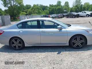 2017 Honda Accord Touring z VIN 1HGCR3F96HA001865, wystawiony jako IAAI lot #42424296 z przebiegiem 170 567 mil mil oraz . Historia ofert i sprzedaży dostępna na DreamBid. Obrazek 13.