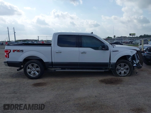 2019 Ford F-150 XL z VIN 1FTEW1E50KKE04180, wystawiony jako IAAI lot #42421022 z przebiegiem 73 912 mil mil oraz . Historia ofert i sprzedaży dostępna na DreamBid. Obrazek 14.