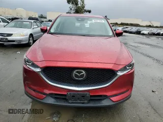 2021 Mazda CX-5 Touring with VIN JM3KFACM8M0406987, listed as a Copart auction lot 45241535 with 57,673 mi miles and Salvage Title. Bid and sale history available at carsss.com. Image 5.
