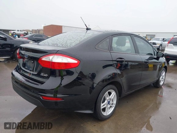 2018 Ford Fiesta SE with VIN 3FADP4BJ2JM101751, listed as a IAAI auction lot 41904545 with 183,630 mi miles and . Bid and sale history available at DreamBid. Image 4.