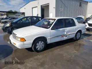 1994 Plymouth Acclaim z VIN 3P3AA4630RT275149, wystawiony jako Copart lot #79877324 z przebiegiem 125 175 mil mil oraz Szkody całkowita. Historia ofert i sprzedaży dostępna na DreamBid. Obrazek 1.