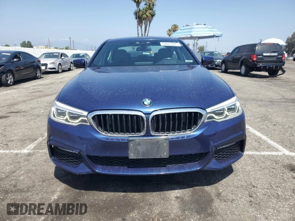 2018 BMW 5 Series 540i with VIN WBAJE5C51JWA94673, listed as a Copart auction lot 59807825 with 77,051 mi miles and Salvage title. Bid and sale history available at DreamBid. Image 5.