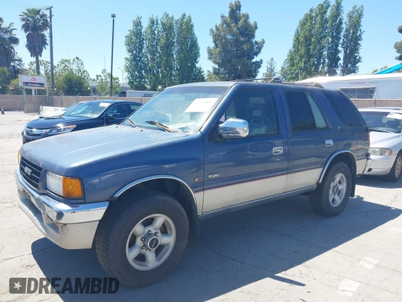 1996 Isuzu Rodeo z VIN 4S2CM58V6T4310394, wystawiony jako IAAI lot #42215009 z przebiegiem 244 151 mil mil oraz . Historia ofert i sprzedaży dostępna na DreamBid. Obrazek 6.
