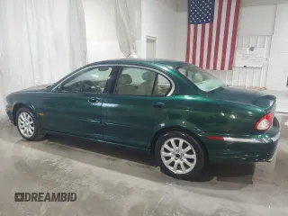 2003 Jaguar X-Type 2.5L Manual z VIN SAJEA51D63XD54591, wystawiony jako Copart lot #57638355 z przebiegiem Nie podano mil oraz Szkody całkowita. Historia ofert i sprzedaży dostępna na DreamBid. Obrazek 2.