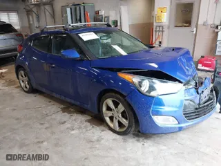 2014 Hyundai Veloster with VIN KMHTC6AD4EU196870, listed as a IAAI auction lot 41207663 with 119,252 mi miles. Bid and sale history available at carsss.com. Image 1.