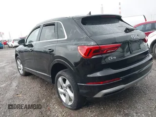 2019 Audi Q3 Premium with VIN WA1AECF34K1077471, listed as a IAAI auction lot 42658213 with 125,889 mi miles and . Bid and sale history available at DreamBid. Image 3.