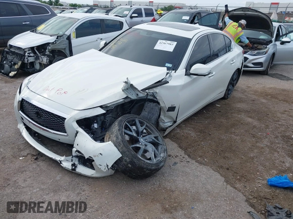 2015 Infiniti Q50 Premium z VIN JN1BV7APXFM352327, wystawiony jako IAAI lot #42367983 z przebiegiem 110 636 mil mil oraz . Historia ofert i sprzedaży dostępna na DreamBid. Obrazek 17.