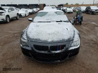 2007 BMW 6 Series M6 with VIN WBSEK93517CY78050, listed as a Copart auction lot 77891944 with 83,403 mi miles and Salvage Title. Bid and sale history available at carsss.com. Image 5.