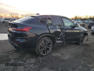 2019 BMW X4 M40i z VIN 5UXUJ5C5XKLA93583, wystawiony jako Copart lot #84643664 z przebiegiem Nie podano mil oraz Szkoda całkowita • Salvage title. Historia ofert i sprzedaży dostępna na DreamBid. Obrazek 3.