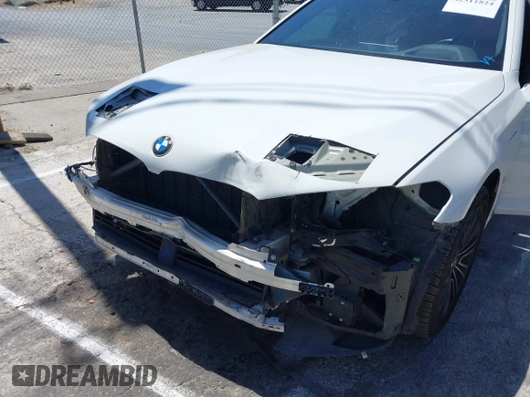 2019 BMW 5 Series 530e with VIN WBAJA9C53KB391999, listed as a IAAI auction lot 42311824 with 79,196 mi miles and . Bid and sale history available at DreamBid. Image 6.