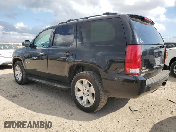 2011 GMC Yukon SLT with VIN 1GKS1CE0XBR221866, listed as a Copart auction lot 79554954 with 320,408 mi miles and Salvage Title. Bid and sale history available at carsss.com. Image 2.