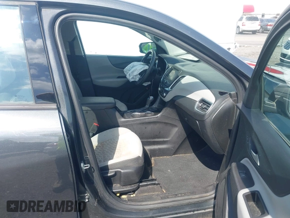 2019 Chevrolet Equinox LS z VIN 2GNAXHEV9K6146286, wystawiony jako IAAI lot #42101137 z przebiegiem 85 098 mil mil oraz . Historia ofert i sprzedaży dostępna na DreamBid. Obrazek 5.