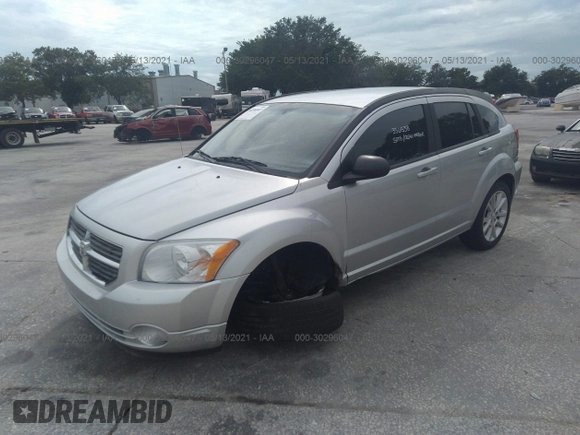 2011 Dodge Caliber Heat with VIN 1B3CB5HA7BD160827, listed as a IAAI auction lot 41374295 with 127,403 mi miles and . Bid and sale history available at DreamBid. Image 2.