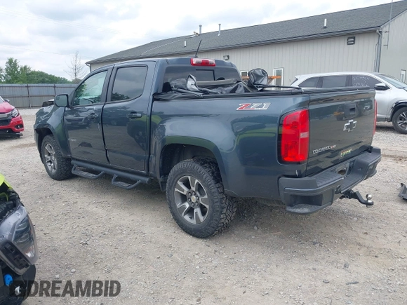 2019 Chevrolet Colorado 4WD Z71 with VIN 1GCGTDEN5K1328061, listed as a IAAI auction lot 42505934 with 76,520 mi miles and . Bid and sale history available at DreamBid. Image 3.