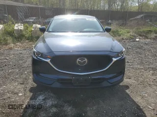 2019 Mazda CX-5 Touring with VIN JM3KFBCM6K0591608, listed as a Copart auction lot 53518385 with 61,618 mi miles and Salvage Title. Bid and sale history available at carsss.com. Image 5.