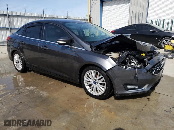 2015 Ford Focus Titanium с VIN 1FADP3J2XFL200668, выставлен на аукционе Copart как лот 54010865 с пробегом 138 459 миль миль и Списание • Salvage title. История ставок и продаж доступна на DreamBid. Изображение 4.