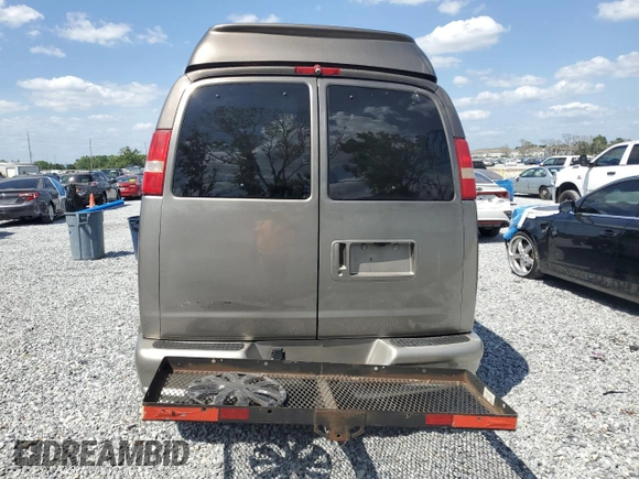 2006 Chevrolet Express Passenger z VIN 1GBFG15T161154772, wystawiony jako Copart lot #51090025 z przebiegiem 114 152 mil mil oraz Szkoda całkowita • Salvage title. Historia ofert i sprzedaży dostępna na DreamBid. Obrazek 6.