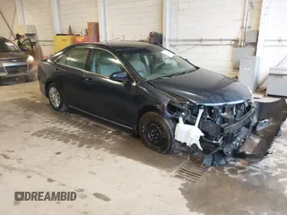 2014 Toyota Camry L with VIN 4T4BF1FK4ER379544, listed as a IAAI auction lot 41837701 with 114,136 mi miles. Bid and sale history available at carsss.com. Image 1.