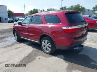 2013 Dodge Durango Crew z VIN 1C4RDJDG6DC672934, wystawiony jako IAAI lot #42542073 z przebiegiem 181 812 mil mil oraz . Historia ofert i sprzedaży dostępna na DreamBid. Obrazek 3.