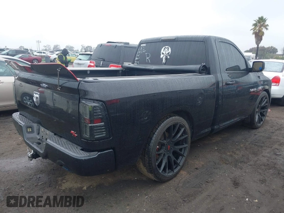 2015 Ram 1500 Sport with VIN 3C6JR6CTXFG631370, listed as a IAAI auction lot 41351518 with 65,375 mi miles and . Bid and sale history available at DreamBid. Image 4.