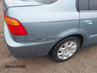 2000 Honda Civic VP z VIN 2HGEJ6612YH575604, wystawiony jako IAAI lot #42395535 z przebiegiem 164 185 mil mil oraz . Historia ofert i sprzedaży dostępna na DreamBid. Obrazek 18.