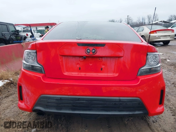 2015 Scion tC z VIN JTKJF5C79FJ013303, wystawiony jako IAAI lot #41581714 z przebiegiem Nie podano mil oraz . Historia ofert i sprzedaży dostępna na DreamBid. Obrazek 16.