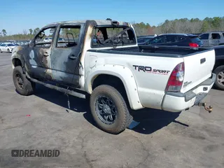 2014 Toyota Tacoma with VIN 5TFLU4EN0EX098815, listed as a IAAI auction lot 41675606 with 89,365 mi miles. Bid and sale history available at carsss.com. Image 3.