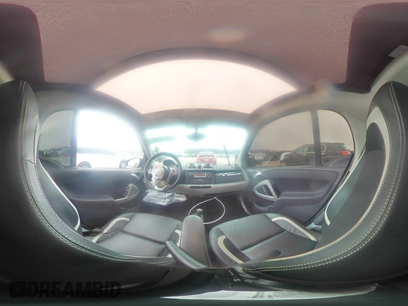 2015 Smart fortwo Passion z VIN WMEEJ3BA9FK791881, wystawiony jako Copart lot #43876595 z przebiegiem 56 699 mil mil oraz Szkody całkowita. Historia ofert i sprzedaży dostępna na DreamBid. Obrazek 13.