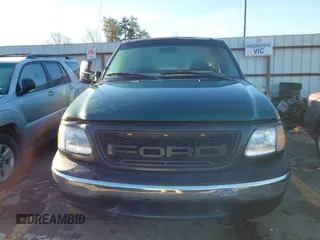 1999 Ford F-150 z VIN 1FTRX18W7XNA40655, wystawiony jako IAAI lot #41445754 z przebiegiem 362 296 mil mil oraz . Historia ofert i sprzedaży dostępna na DreamBid. Obrazek 12.